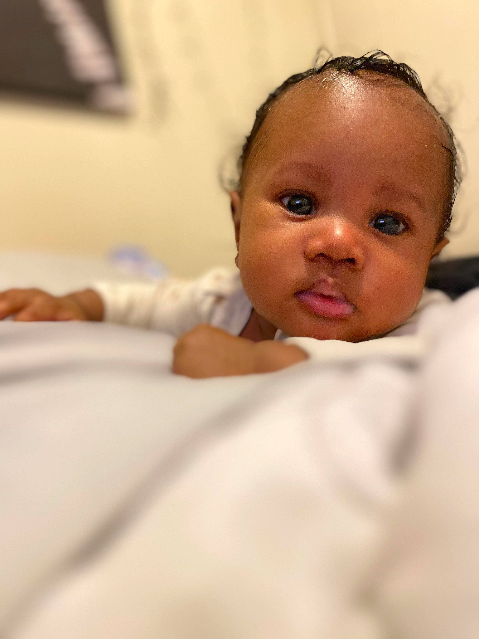 Azriel joined the competition — help win amazing prizes! baby, bed, bedding, black_hair, cheek, comfort, eyelash, flash_photography, flooring, fun, gesture, happy, human_body, iris, linens, lip, nose, person, skin, smile