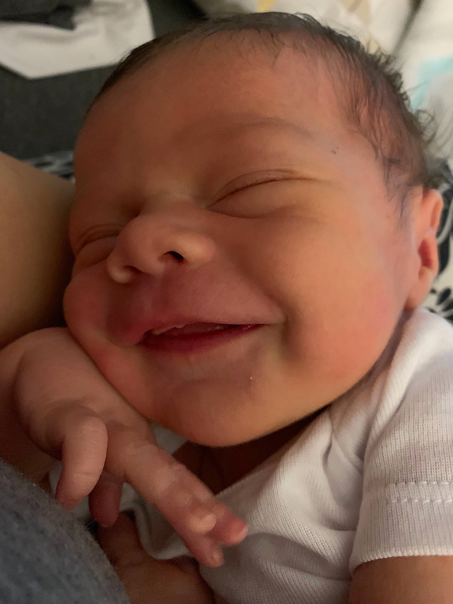 Kemper is registered to the contest to win money with this photo: baby, cheek, child, chin, close_up, ear, eye, face, facial_expression, finger, forehead, hand, head, lip, mouth, nose, person, skin, sleep, smile