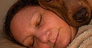 Mia Grace is registered to the contest to win money with this photo: woman, dog, sleeping, cozy, blanket, closeup, face, pet, companion, rest, comfort, warm, indoor, relaxation, friendship, animal, human, bond, cuddle, peaceful