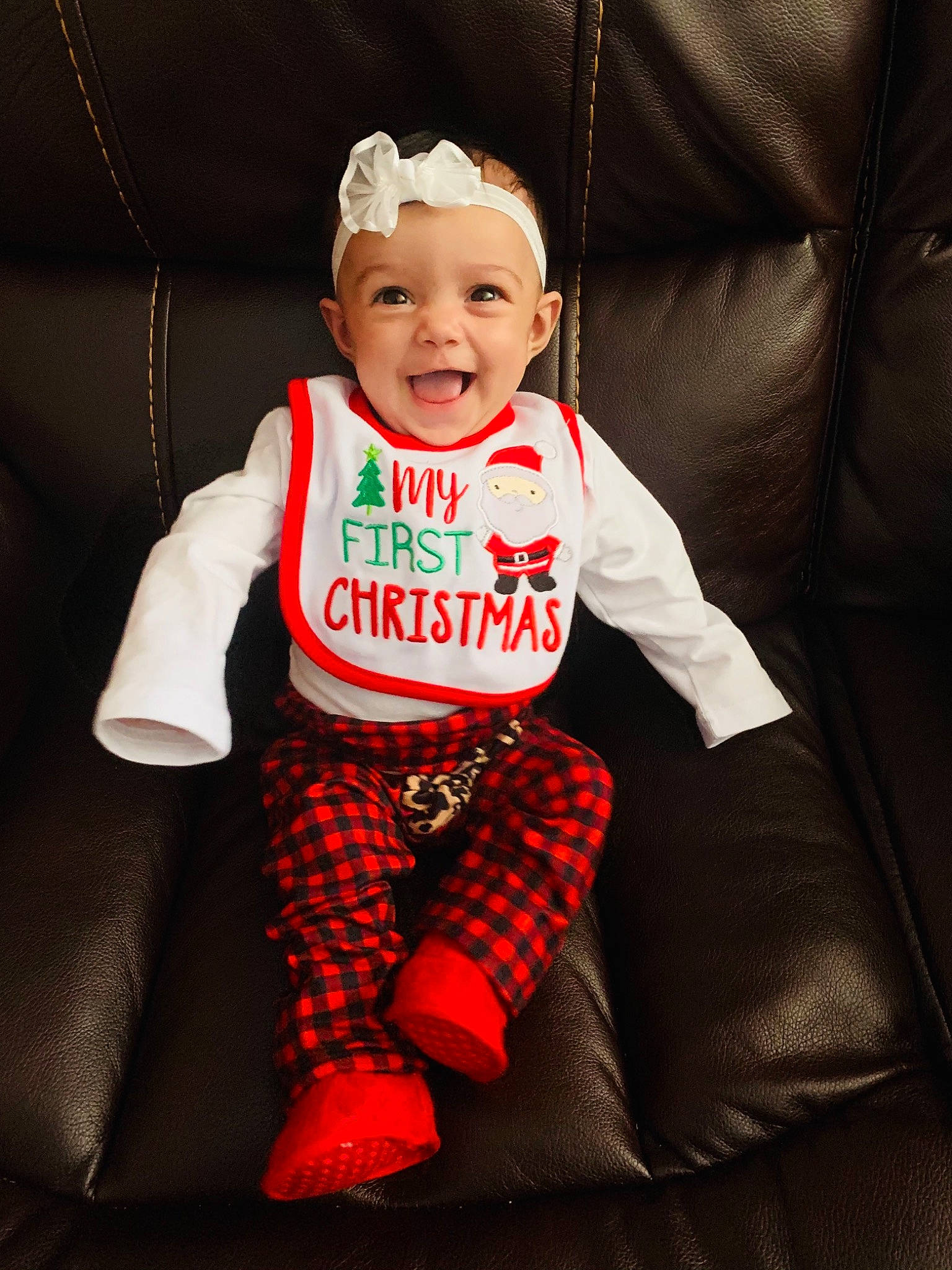 Emberleigh is registered to the contest to win money with this photo: baby, baby_laughing, baby_products, baby_toddler_clothing, child, comfort, costume_accessory, ear, eye, fictional_character, headwear, human_body, joy, laugh, mouth, nose, person, plaid, pleased, sleeve