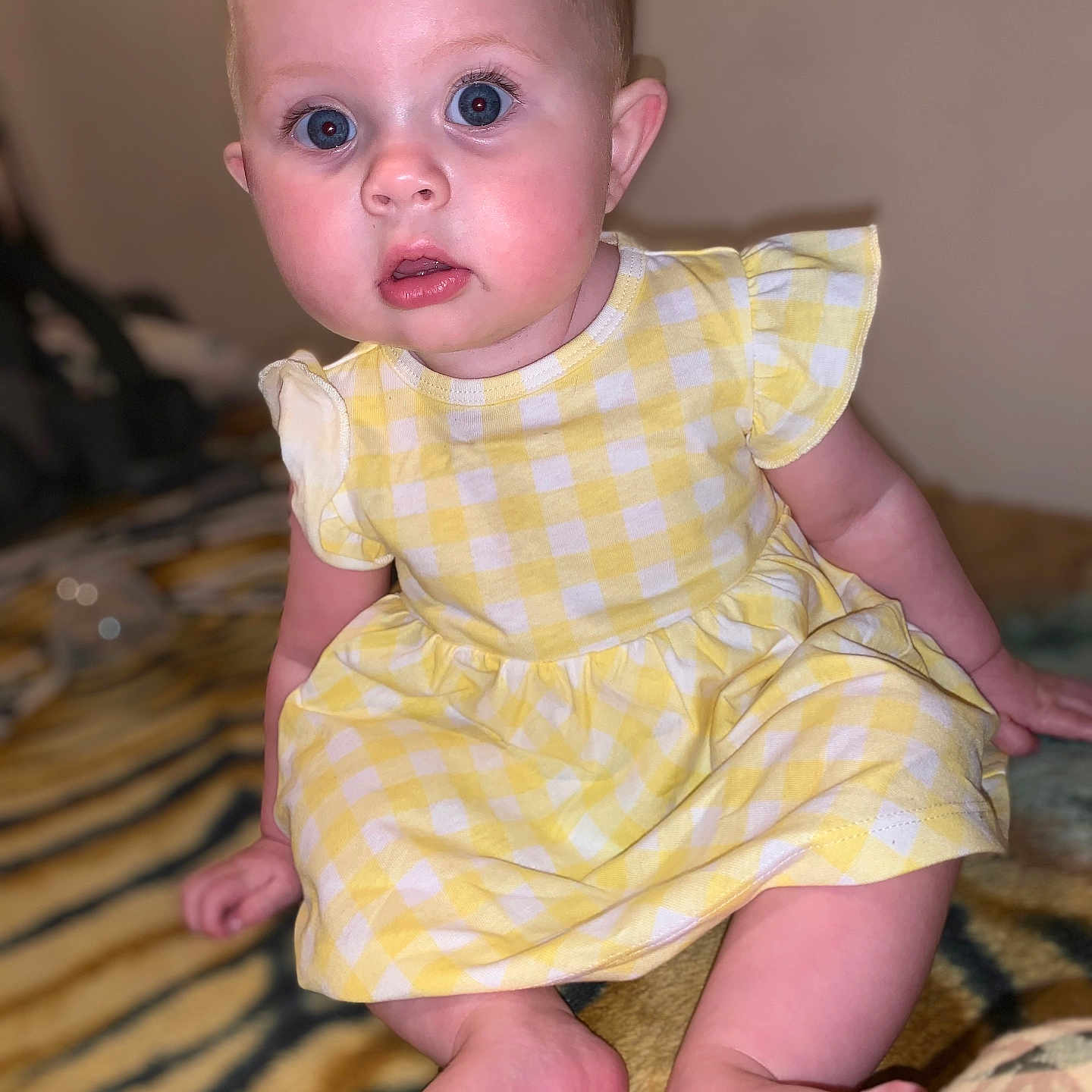 Ivy joined the competition — help win amazing prizes! baby, blanket, bodypart, clothing, couch, crawling, cushion, dress, face, finger, furniture, hand, head, newborn, person, photography, portrait, sitting, standing, toe