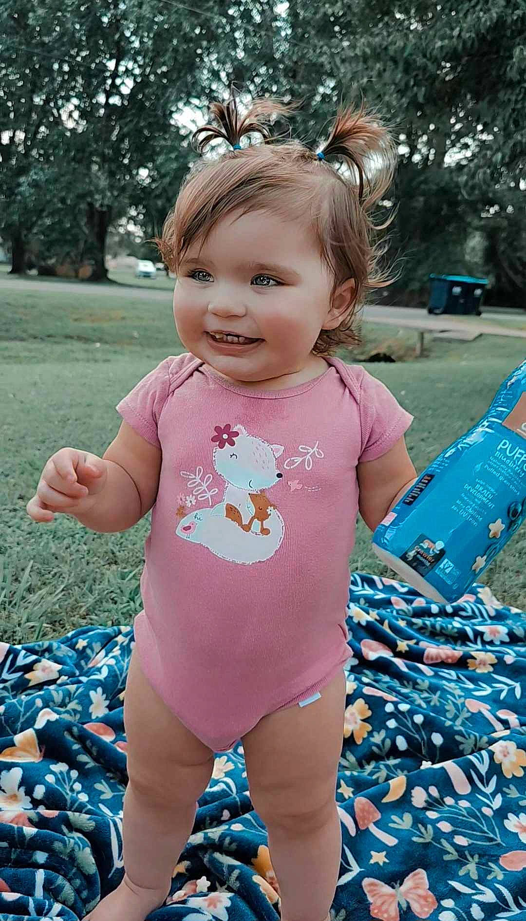 Iris joined the competition — help win amazing prizes! baby, baby_toddler_clothing, blue, child, cool, electric_blue, fun, grass, hairstyle, happy, joy, leisure, pattern, people_in_nature, person, pink, plant, sleeve, smile, t_shirt