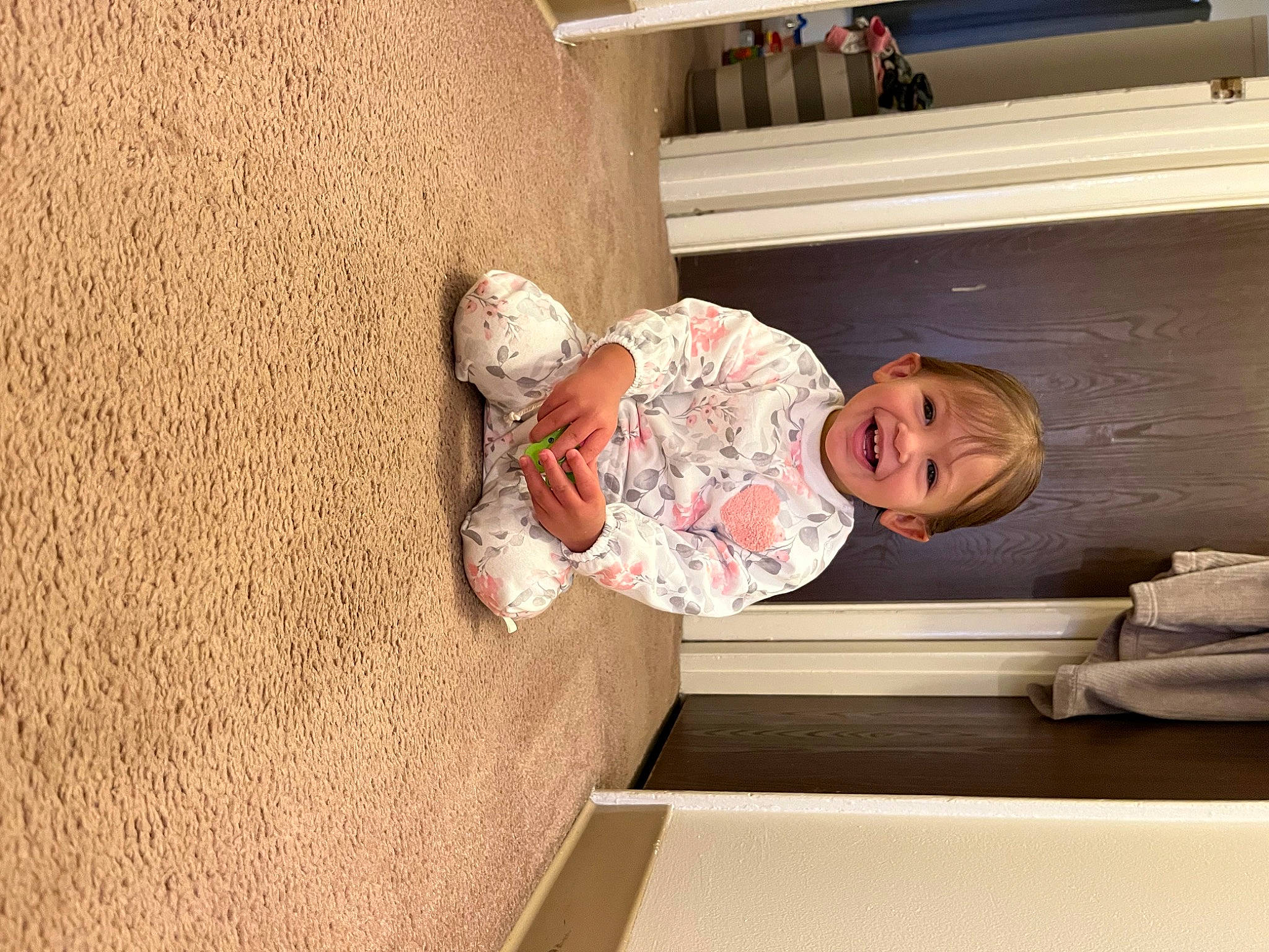 Danielle joined the competition — help win amazing prizes! baby, baby_toddler_clothing, child, comfort, couch, floor, flooring, hardwood, hat, joy, linens, person, room, shelf, sleeve, smile, stairs, toddler, wall, wood