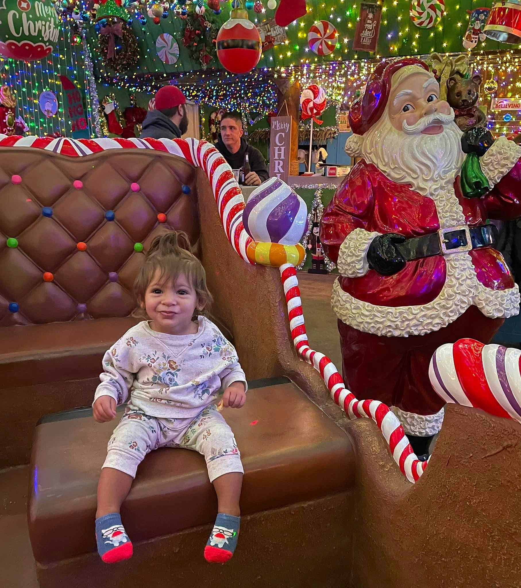 Danielle is registered to the contest to win money with this photo: beard, child, christmas_decoration, christmas_ornament, design, event, fun, happy, hat, holiday, joy, lap, leisure, mammal, person, photograph, recreation, santa_claus, smile, snapshot