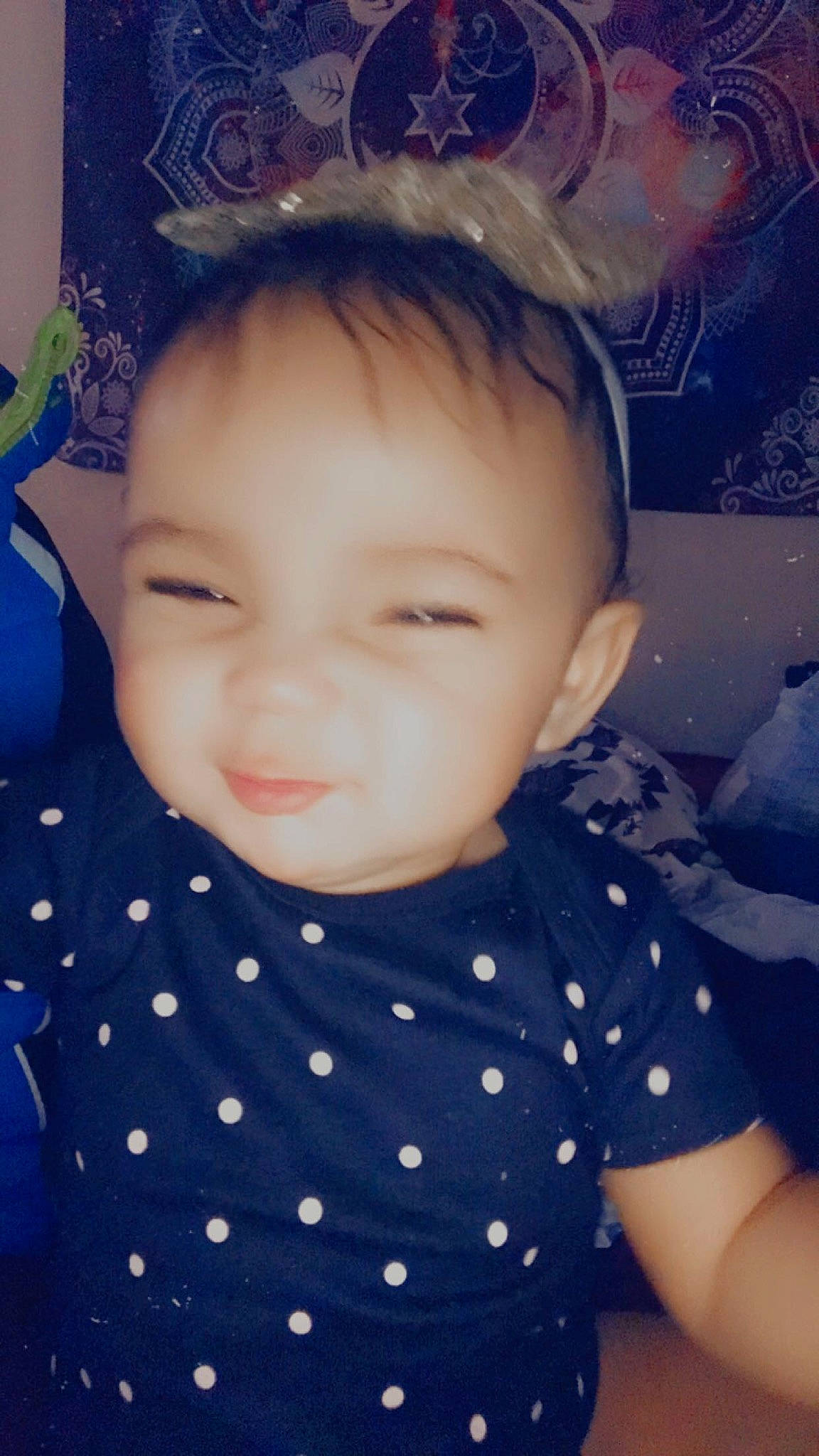 Braelynn is registered to the contest to win money with this photo: baby, baby_toddler_clothing, blue, cheek, chin, cool, ear, eyelash, hairstyle, happy, head, iris, nose, organ, pattern, person, skin, sleeve, smile, textile