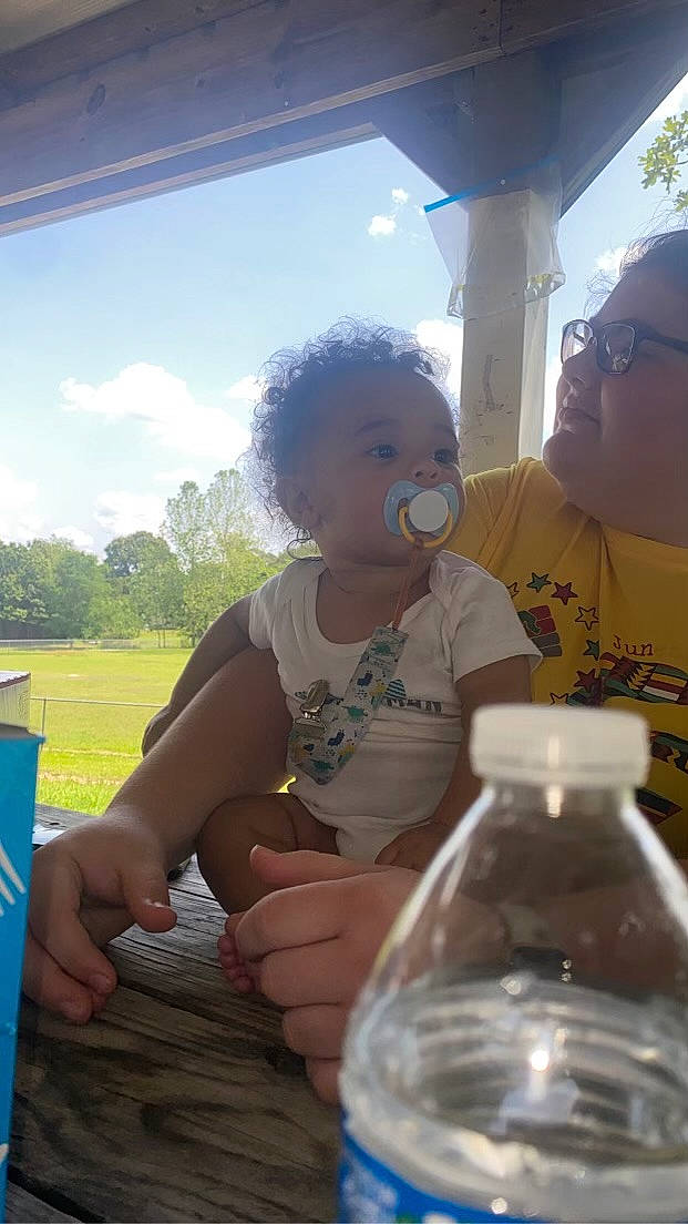 Jahvail is registered to the contest to win money with this photo: blue, bottle, child, cloud, drink, drinkware, event, fun, glass, happy, leisure, light, morning, person, plastic_bottle, recreation, sky, t_shirt, toddler, tree