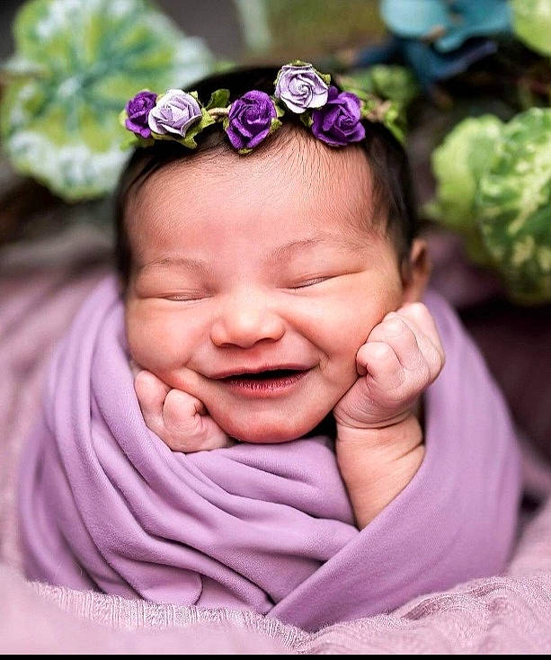 Harlow joined the competition — help win amazing prizes! arm, chin, eye, eyebrow, face, finger, gesture, grass, hand, happy, head, iris, mouth, people_in_nature, person, petal, pink, plant, skin, smile