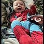 baby, blanket, child, clothing, cozy, cute, face, happy, head, indoor, infant, laughing, person, portrait, relaxed, smiling, soft, spiderman_outfit, warm, young_child