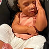 Sariyah joined the competition — help win amazing prizes! baby, car_seat, child, closed_eyes, curly_hair, cute, hand_on_face, indoors, infant, peaceful, peach_top, pink_sandals, portrait, relaxed, resting, seatbelt, sleeping, toddler, white_pants, young_child