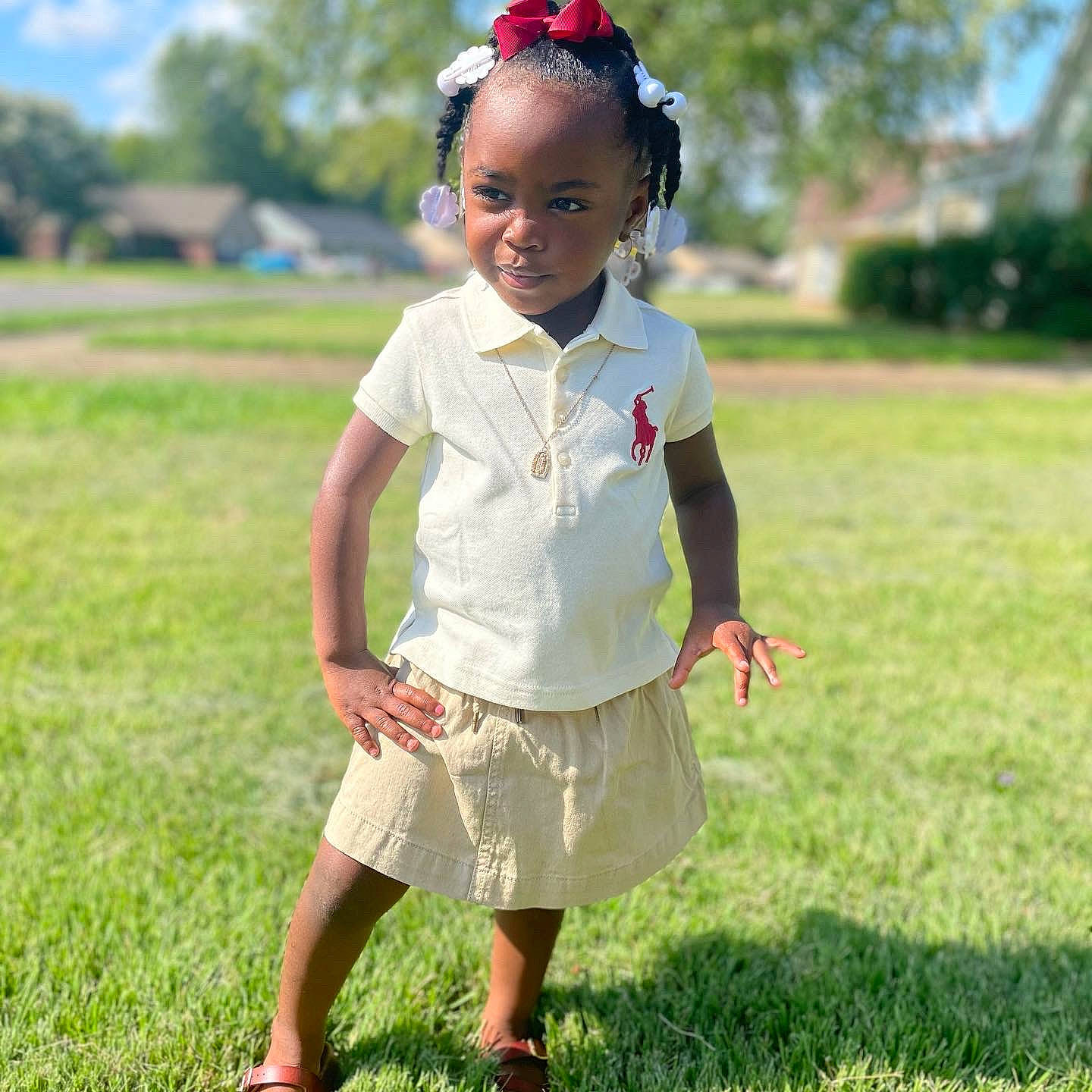 Ivy is registered to the contest to win money with this photo: blackhair, child, clothing, dress, face, female, girl, grass, hair, head, lawn, person, photography, plant, portrait, shorts, sitting, skirt, sleeve, standing