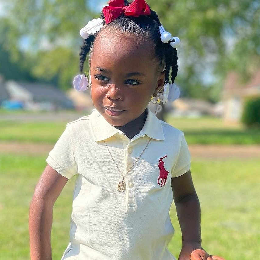 Ivy is registered to the contest to win money with this photo: accessories, blackhair, bodypart, braid, child, clothing, dimples, face, female, girl, hair, happy, head, jewelry, necklace, person, shoulder, sitting, sleeve, smile