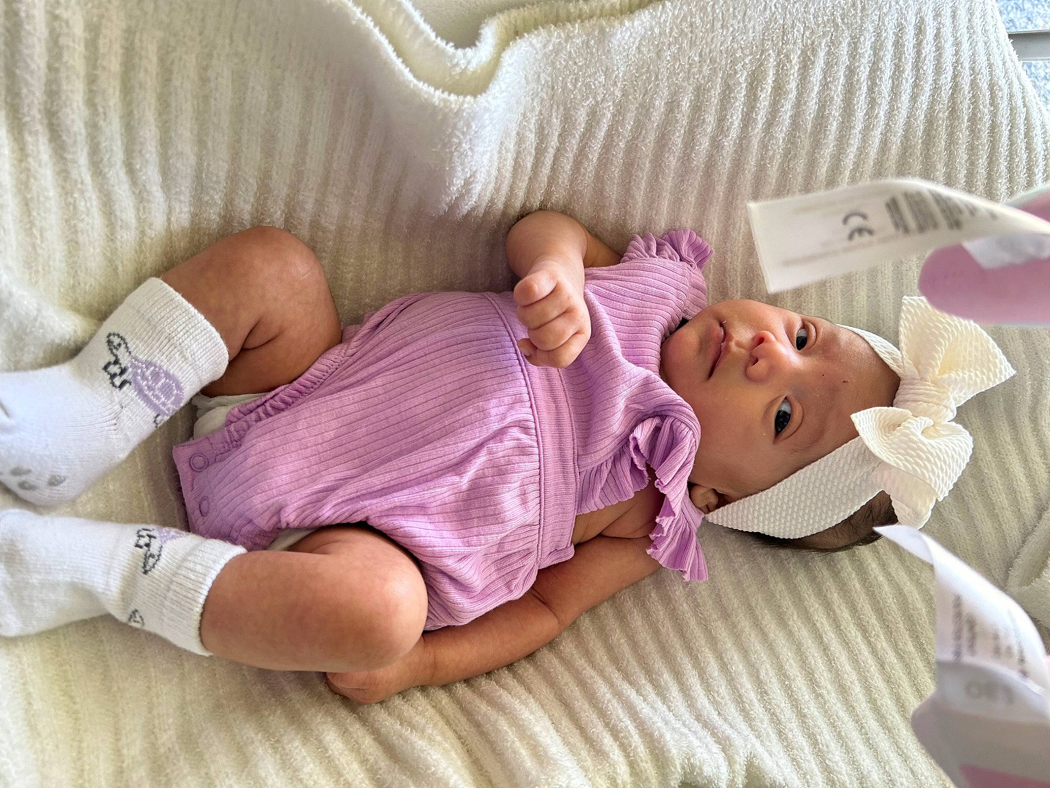 Jenavie joined the competition — help win amazing prizes! arm, baby, baby_products, baby_sleeping, baby_toddler_clothing, bedding, child, comfort, eye, finger, hand, headwear, leg, linens, person, pink, purple, skin, sock, textile
