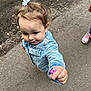 Mia joined the competition — help win amazing prizes! toddler, child, flower, denim_jacket, outdoor, nature, path, hair_accessory, cute, offering, pink_shoes, hand, smile, young_child, casual_clothing, small_flower, portrait, daylight, sidewalk, curly_hair