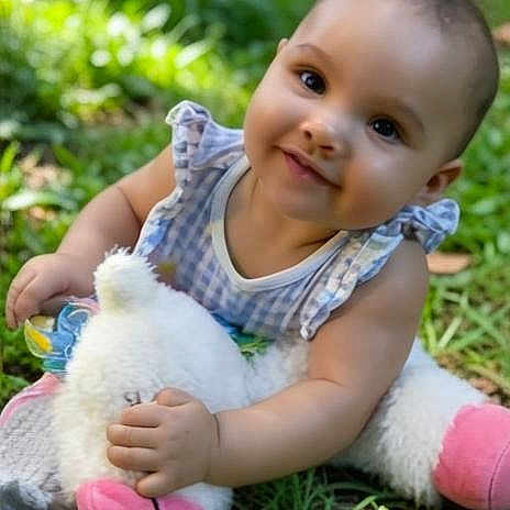 Durrann is registered to the contest to win money with this photo: baby, child, clothing, cute, daylight, grass, greenery, happy, infant, nature, outdoor, park, playful, portrait, sitting, smiling, stuffed_animal, sunlight, toy, young_child