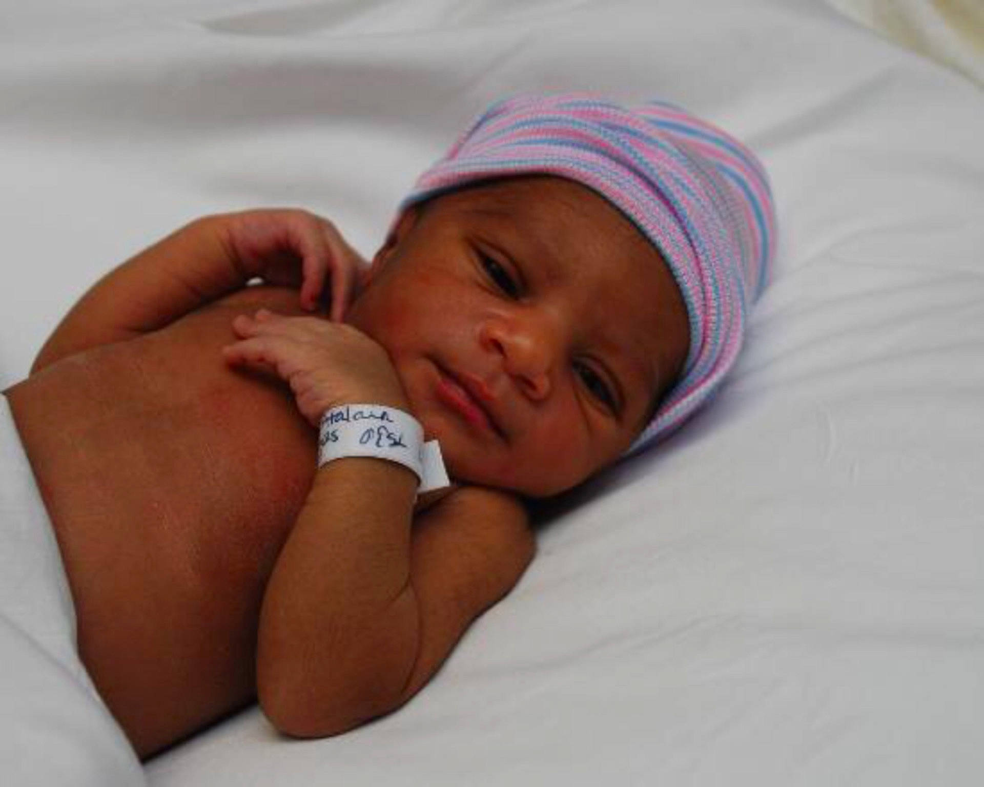 A'Niyla is registered to the contest to win money with this photo: child, finger, hand, infant, person, product