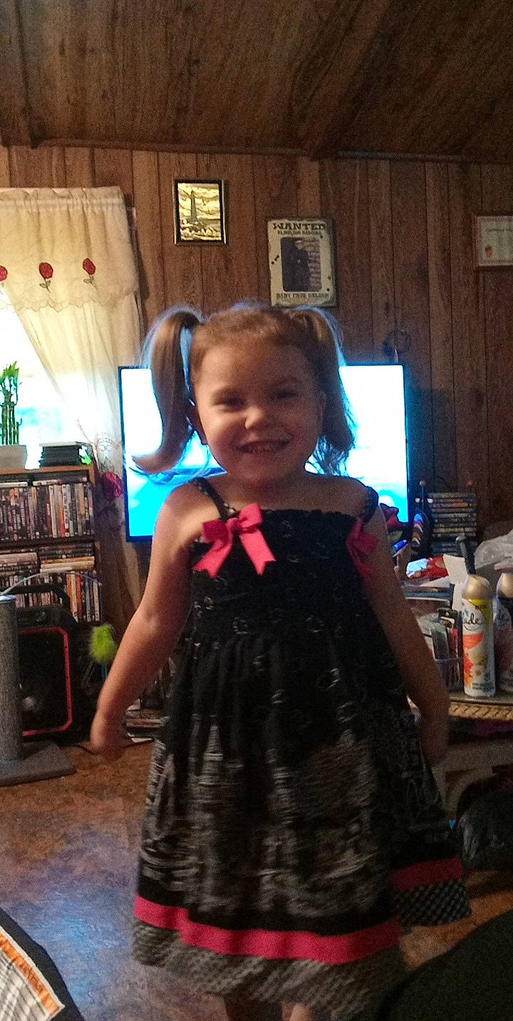 Hope joined the competition — help win amazing prizes! bookcase, child, curtain, dress, event, fashion_design, flooring, formal_wear, fun, hairstyle, happy, joy, pattern, person, picture_frame, room, smile, standing, television, toddler