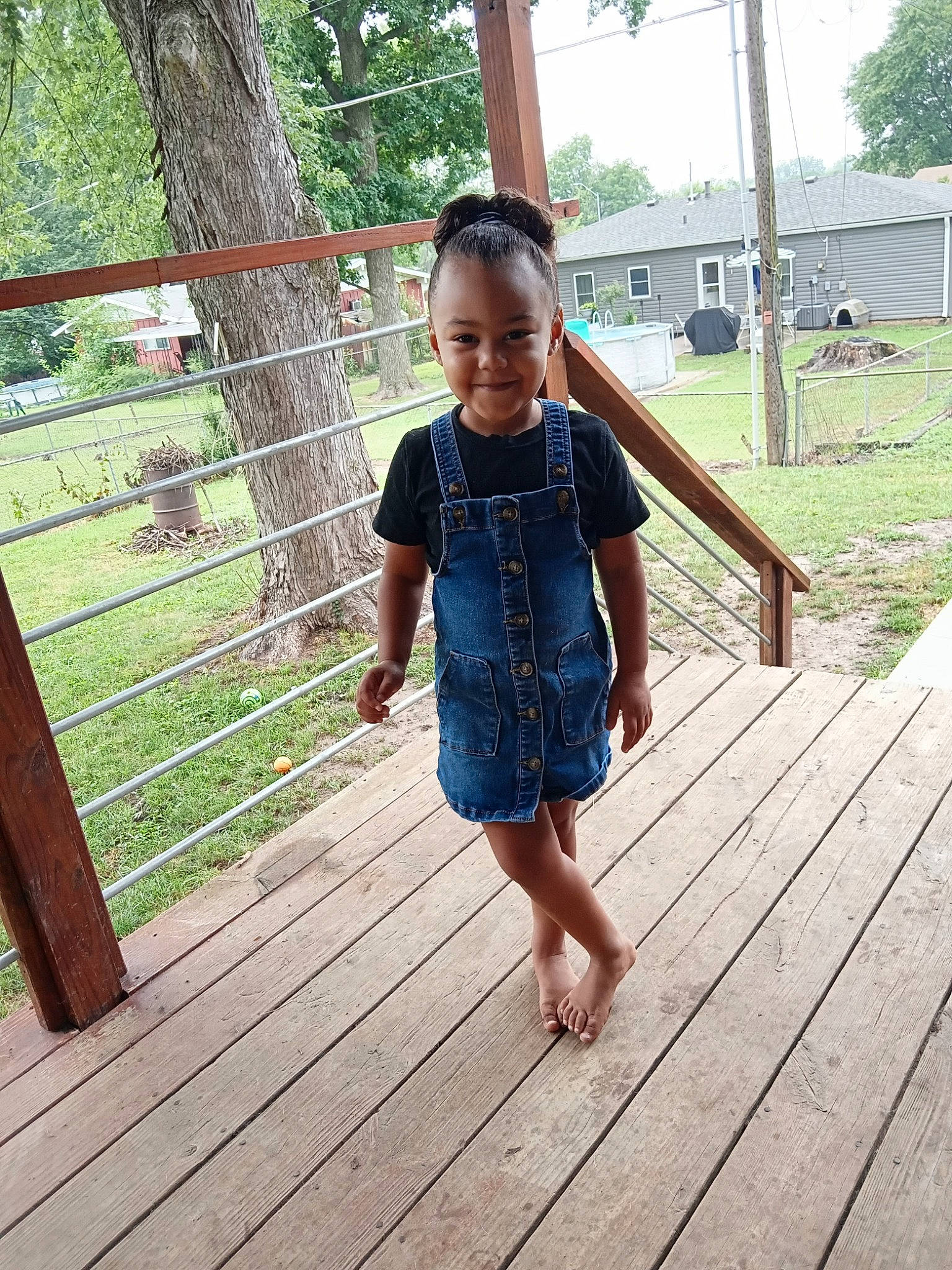 Kennedi joined the competition — help win amazing prizes! baby_toddler_clothing, barefoot, child, deck, flooring, fun, grass, happy, hardwood, joy, leisure, pattern, people_in_nature, person, plant, sky, smile, toddler, tree, waist
