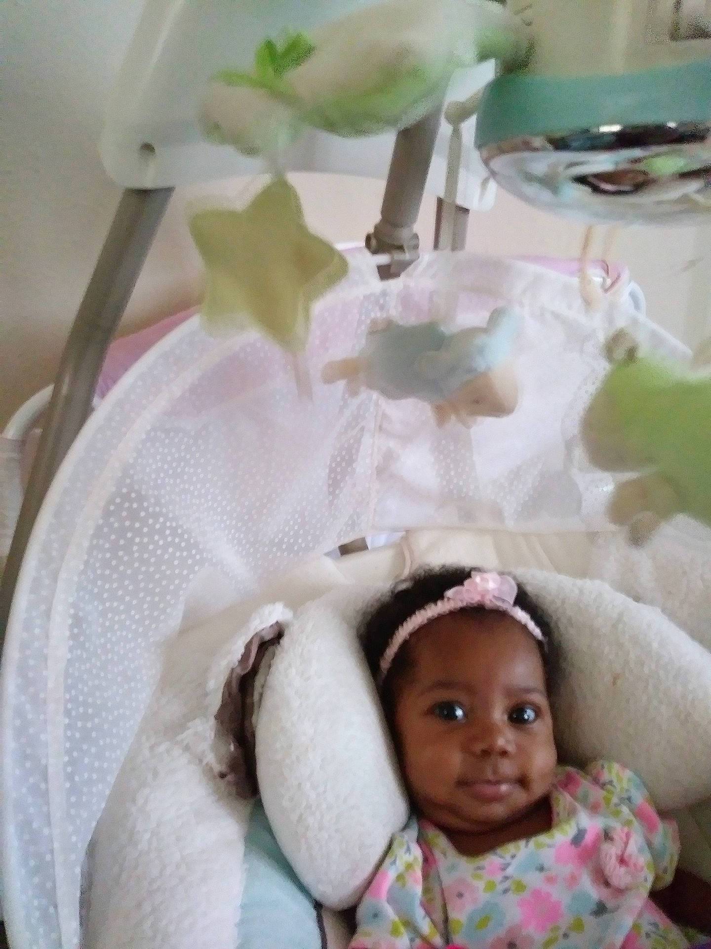 Zaryah is registered to the contest to win money with this photo: baby_products, bed, child, day, furniture, girl, hair_accessory, infant, infant_bed, person, product, textile, toddler