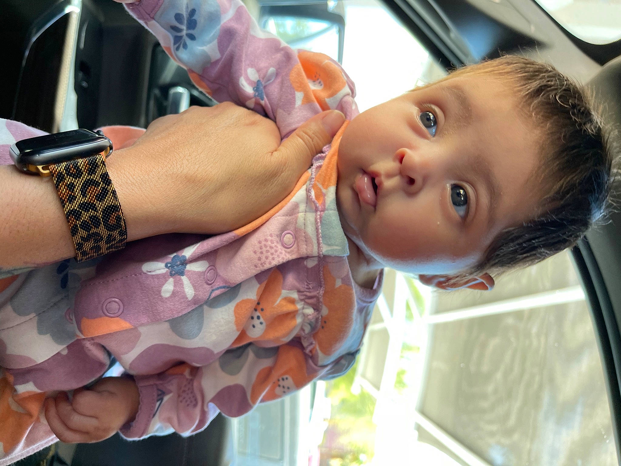Carly is registered to the contest to win money with this photo: black_hair, chest, eyelash, eyewear, finger, fun, gesture, hand, happy, lip, mouth, nail, person, skin, thigh, thumb, toddler, trunk, vehicle_door, window