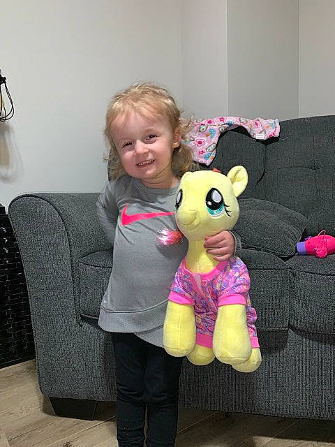 Scarlett is registered to the contest to win money with this photo: child, ear, fawn, joy, person, pink, plush, room, stuffed_toy, teddy_bear, textile, toddler, toy, vacation