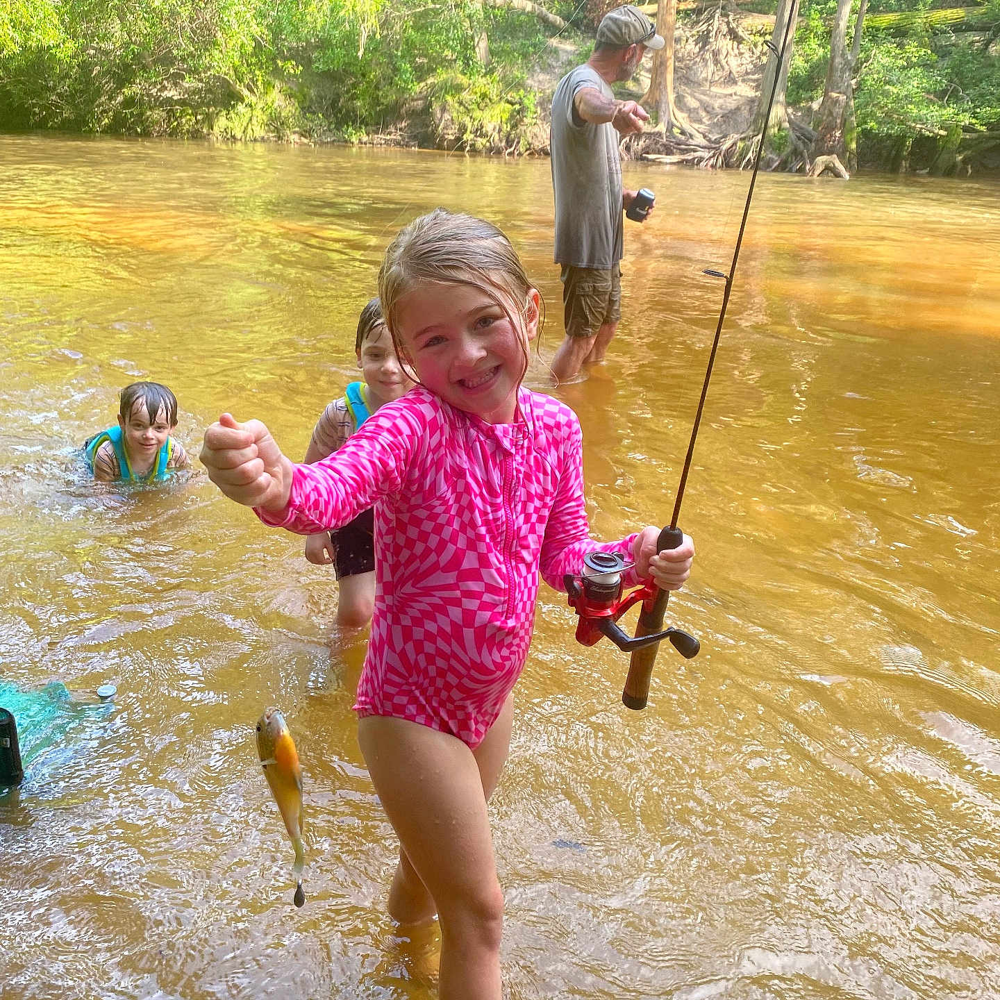 Dyxie joined the competition — help win amazing prizes! child, face, female, fishing, girl, head, land, leisureactivities, nature, outdoors, person, photography, plant, portrait, rock, summer, tree, vegetation, water, woodland