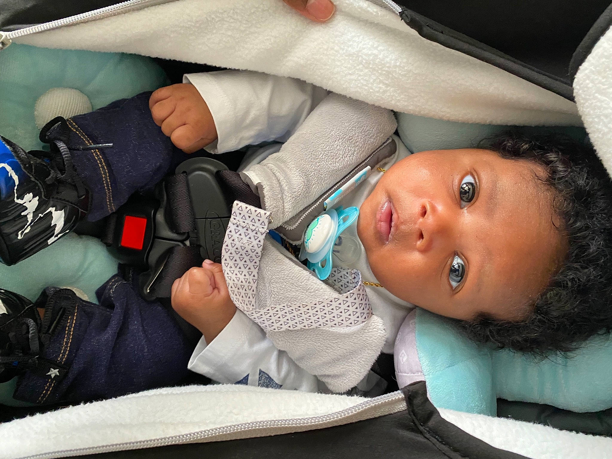 Kristian is registered to the contest to win money with this photo: auto_part, baby, baby_carriage, baby_products, car_seat, child, comfort, fun, gesture, hand, human_body, linens, luxury_vehicle, nail, nap, person, seat_belt, sitting, sleep, toddler