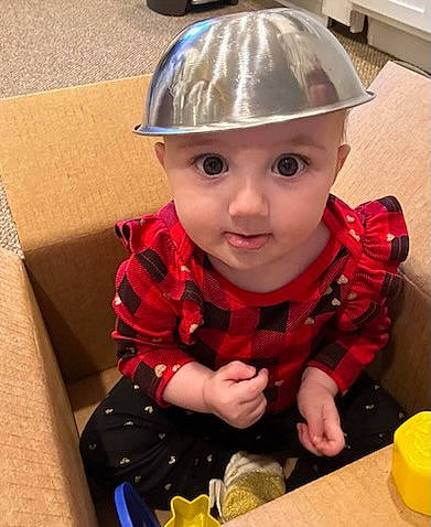 Kennedy joined the competition — help win amazing prizes! baby, baby_toddler_clothing, child, clothing, cool, fashion_accessory, flooring, fun, hat, headwear, helmet, metal, paint, pattern, person, personal_protective_equipment, play, sitting, sleeve, smile