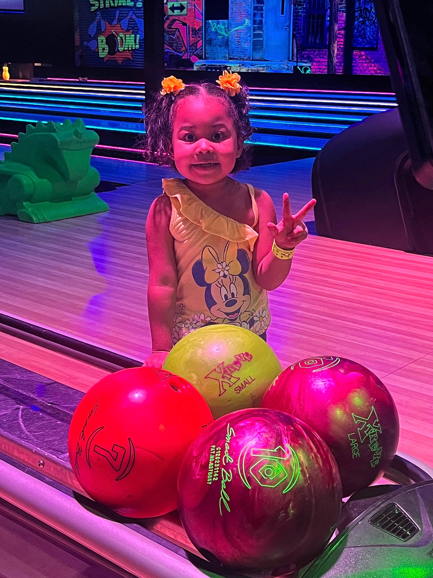 Alanna joined the competition — help win amazing prizes! baby, ball, balloon, bowling, bowlingball, clothing, dress, face, glove, head, leisureactivities, lighting, nightlife, person, photography, portrait, purple, sphere, toy, urban