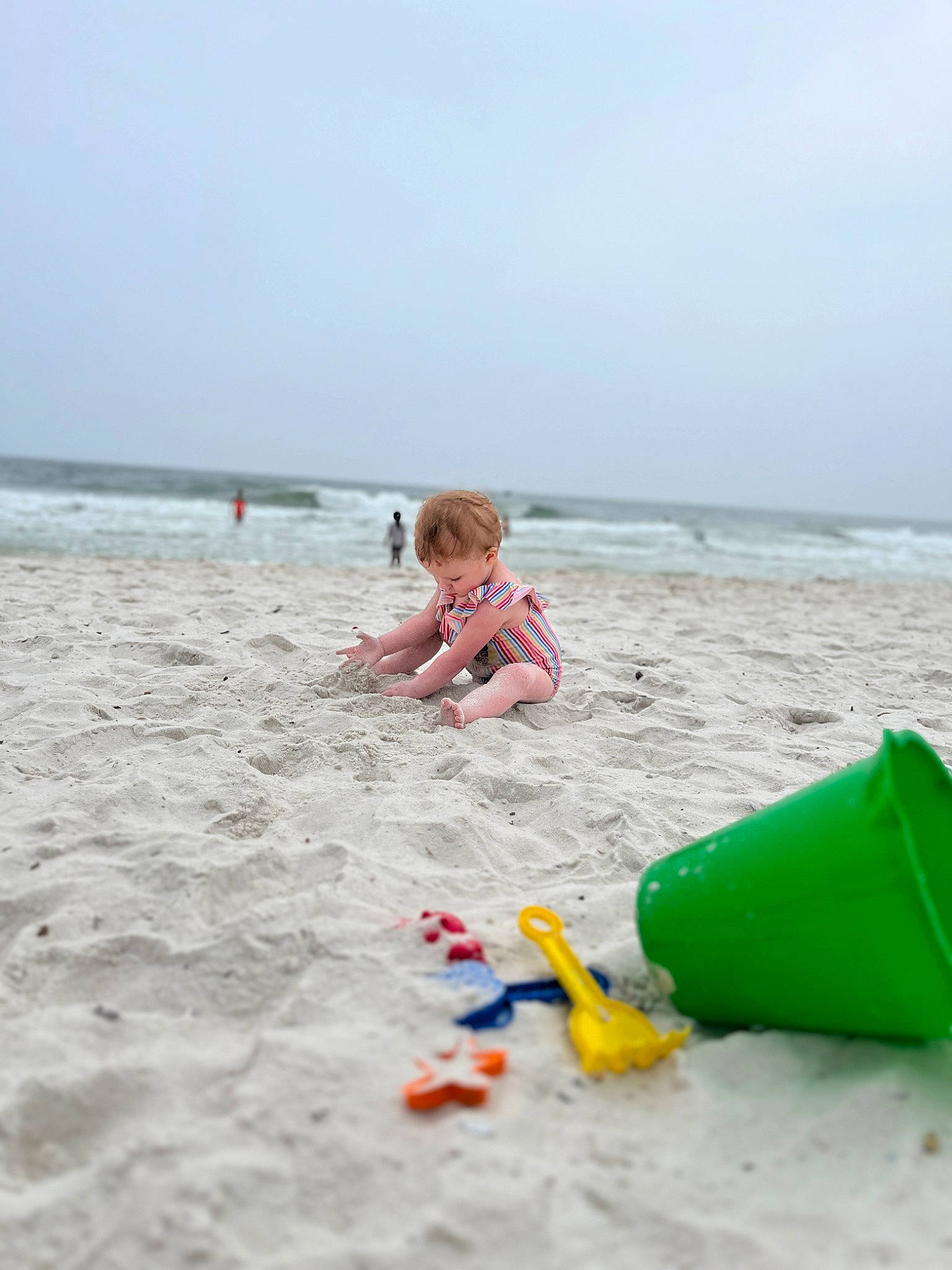Gracelynn joined the competition — help win amazing prizes! baby, bathing, beach, child, coast, fun, holiday, horizon, leisure, ocean, people_on_beach, person, personal_protective_equipment, play, recreation, sand, sky, toddler, water, wave