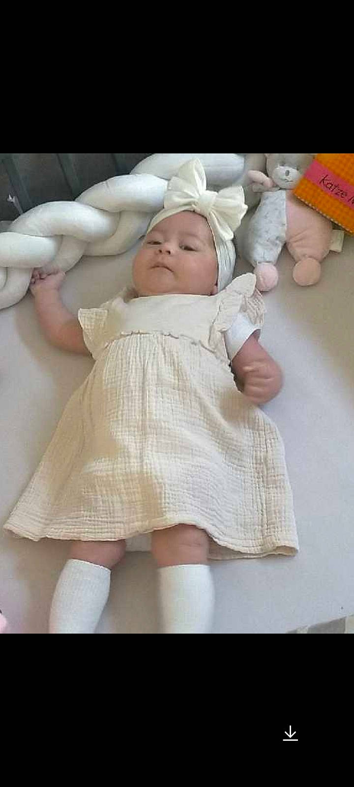 Mya participe au concours pour gagner de l'argent avec cette photo : baby, baby_products, baby_safety, baby_sleeping, baby_toddler_clothing, cheek, child, comfort, gesture, human_leg, leg, linens, nail, pattern, person, pink, sitting, skin, sleeve, thumb