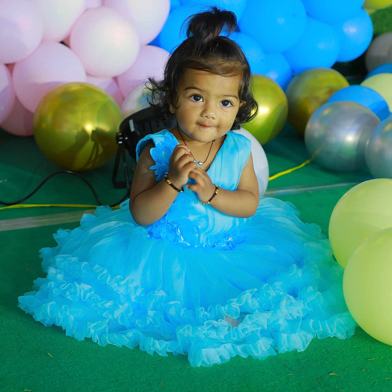 Ishi is registered to the contest to win money with this photo: accessories, balloon, bodypart, bracelet, child, clothing, dress, eveningdress, face, female, finger, formalwear, girl, hand, head, jewelry, necklace, people, person, sphere