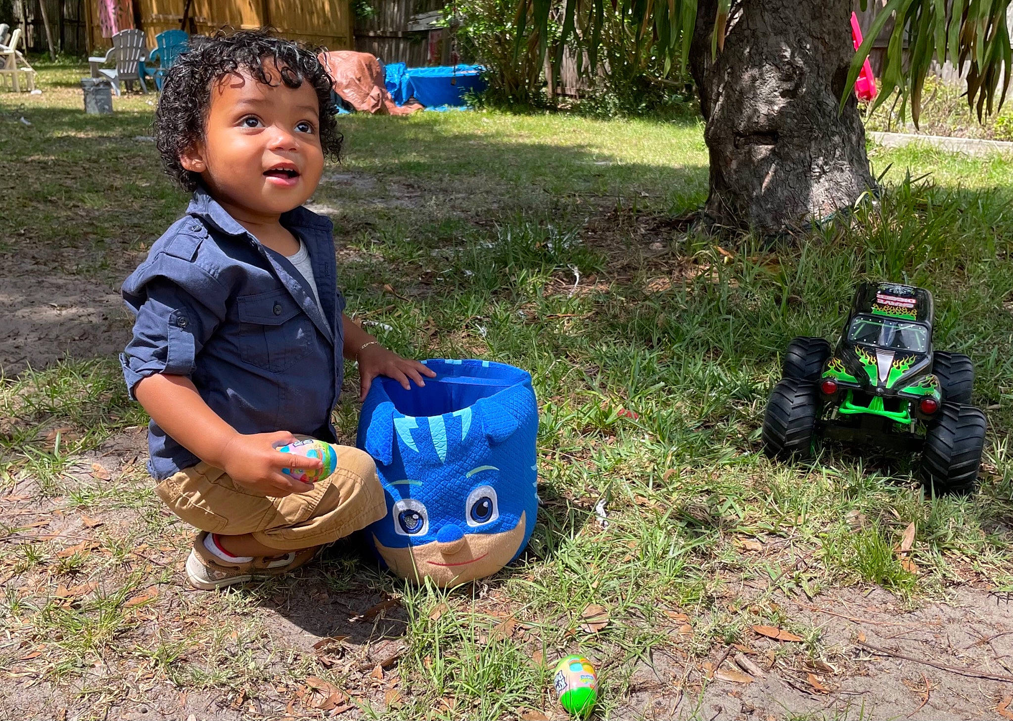 Nikko joined the competition — help win amazing prizes! adaptation, botany, child, fun, grass, green, happy, lawn, leisure, luggage_and_bags, mammal, people_in_nature, person, plant, recreation, sitting, smile, soil, toddler, tree