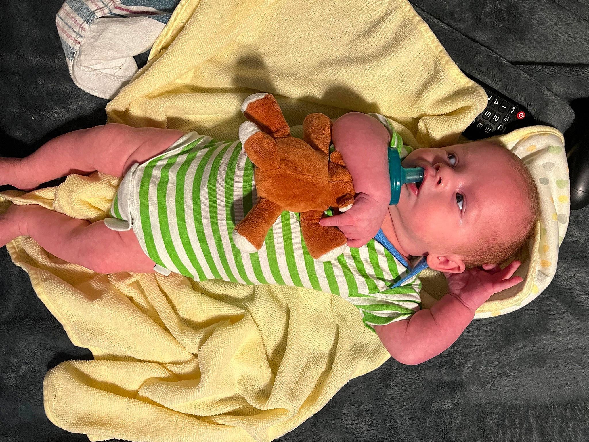 Bennett joined the competition — help win amazing prizes! baby, baby_products, baby_toddler_clothing, cheek, child, comfort, finger, hand, human_body, lap, linens, mammal, nail, organ, pattern, person, sitting, skin, thumb, toddler