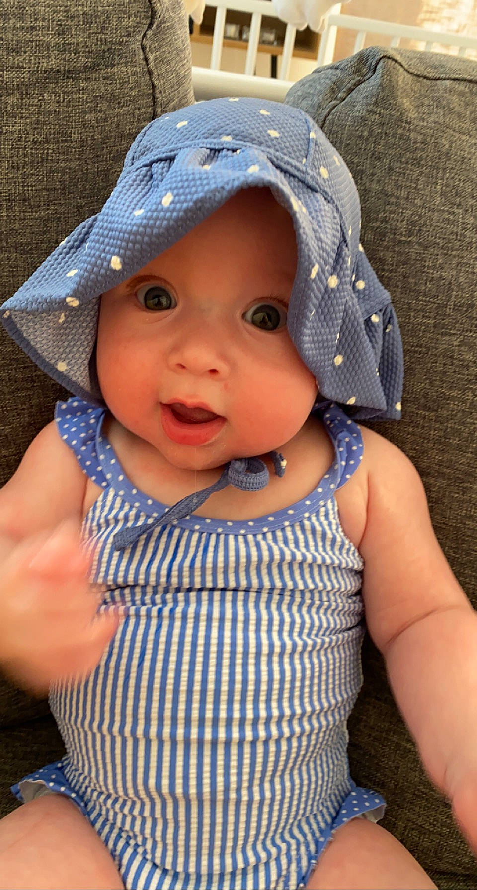 Louise participe au concours pour gagner de l'argent avec cette photo : baby, baby_toddler_clothing, blue, cap, cheek, chin, cool, eye, face, hat, headgear, headwear, iris, lip, outerwear, person, skin, sleeve, smile, sun_hat