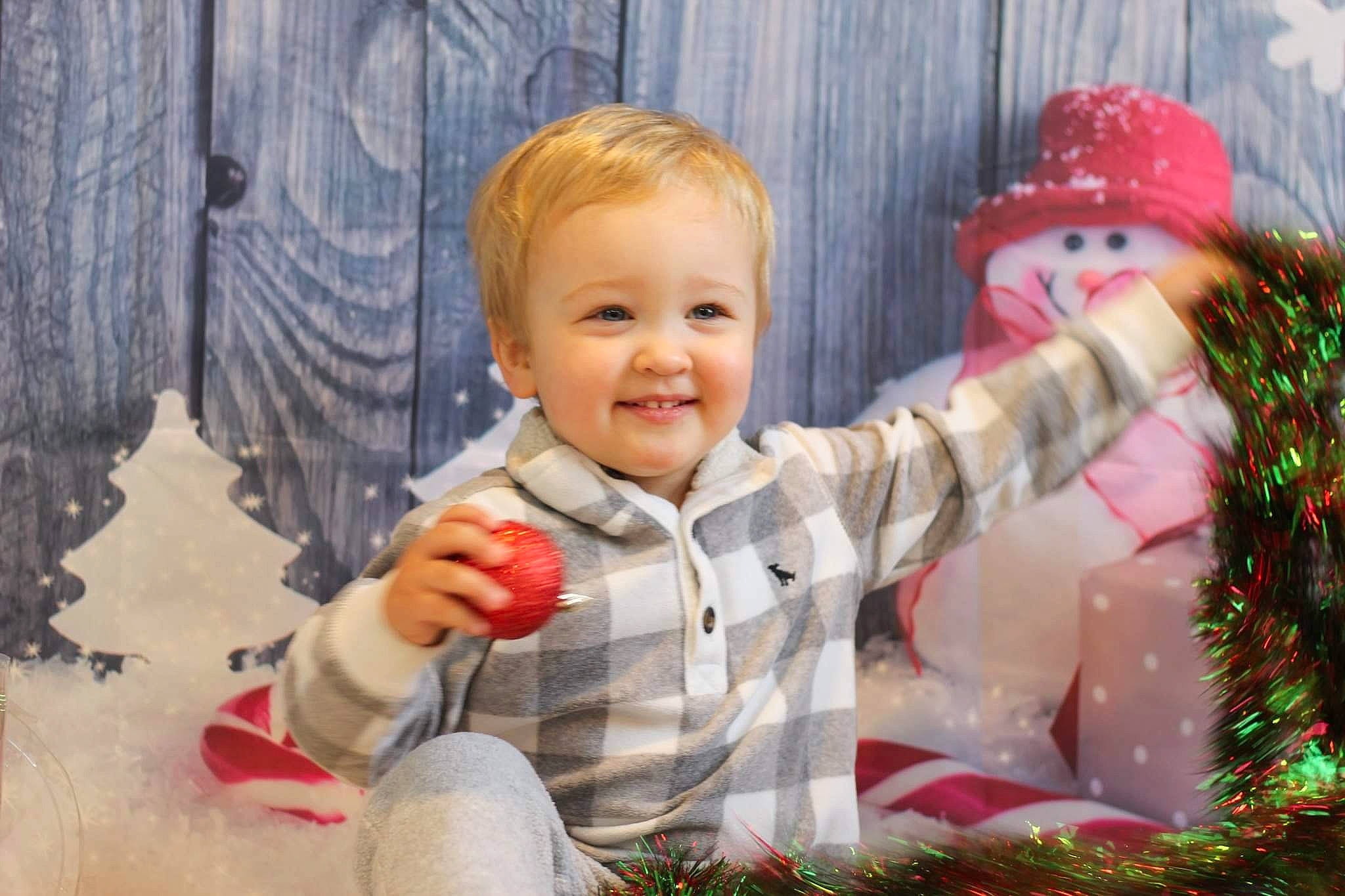 Grant is registered to the contest to win money with this photo: baby, baby_laughing, baby_toddler_clothing, cheek, child, christmas, christmas_decoration, christmas_eve, christmas_ornament, conifer, fir, happy, holiday, human, interior_design, joy, laugh, ornament, person, pine_family