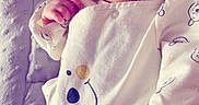Aïko participe au concours pour gagner de l'argent avec cette photo : baby, bear_print, blanket, calm, closed_eyes, closeup, cozy, face, hand, infant, newborn, nursery, onesie, patterned_clothing, pillow, portrait, sleeping, smile_print, soft_texture, tiny_fingers