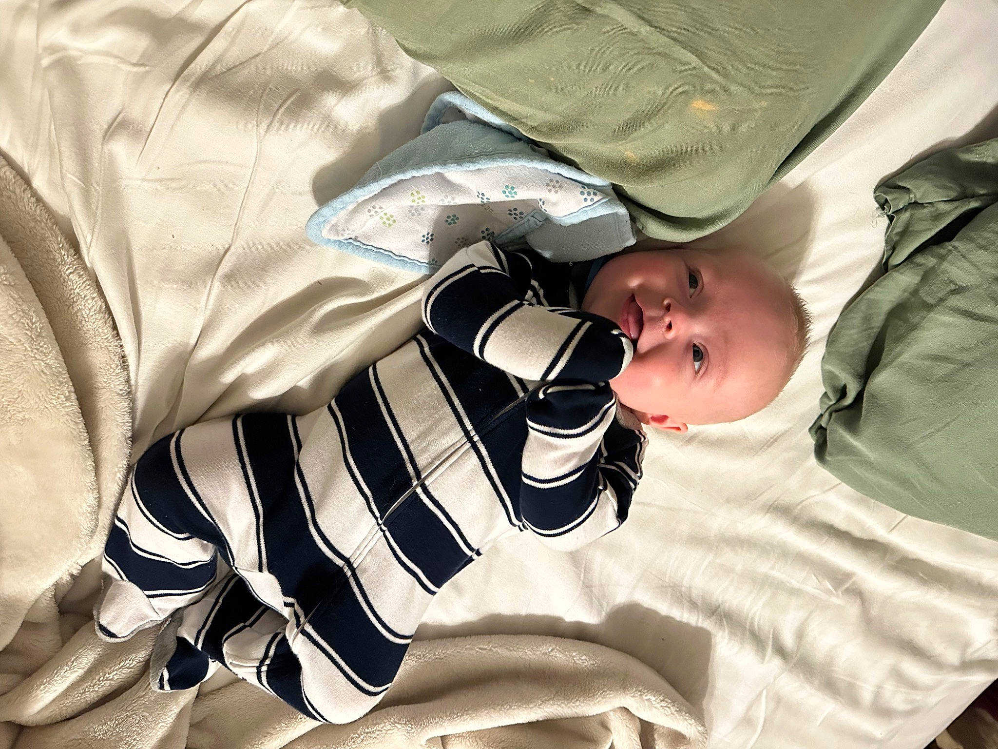 Cayson joined the competition — help win amazing prizes! baby, baby_products, baby_toddler_clothing, child, comfort, elbow, gesture, happy, linens, pattern, person, room, sitting, sleeve, toddler