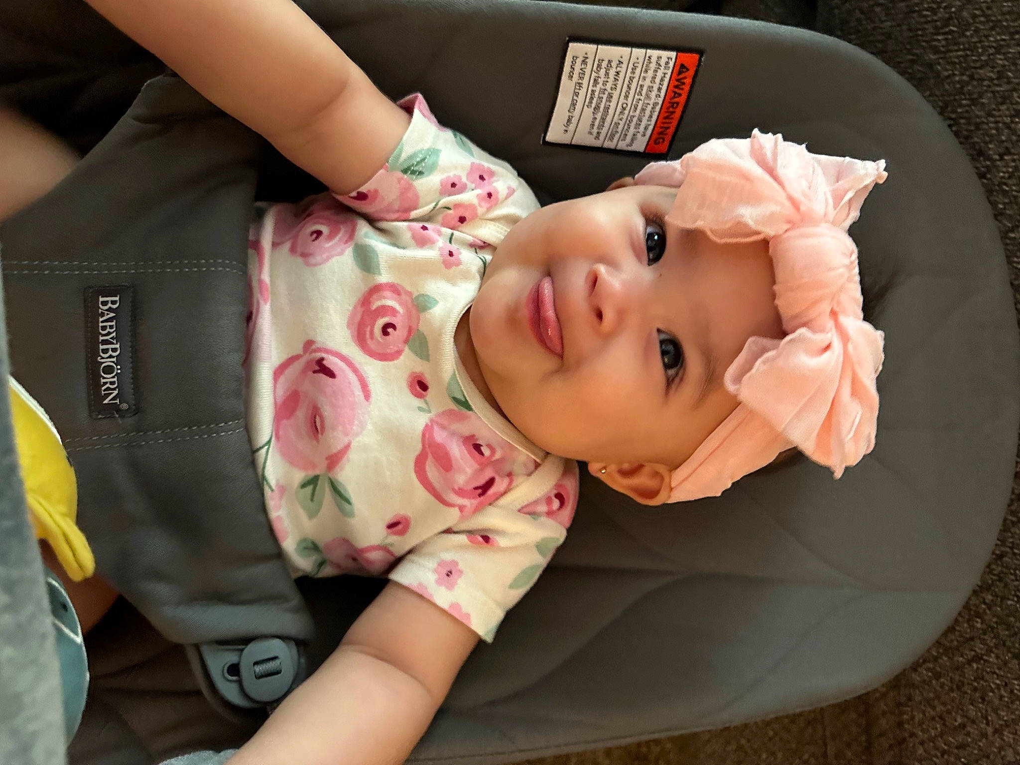 Leighlani is registered to the contest to win money with this photo: arm, baby, baby_products, baby_toddler_clothing, cheek, child, comfort, happy, headwear, joy, pattern, person, pink, product, sitting, skin, sleeve, smile, toddler