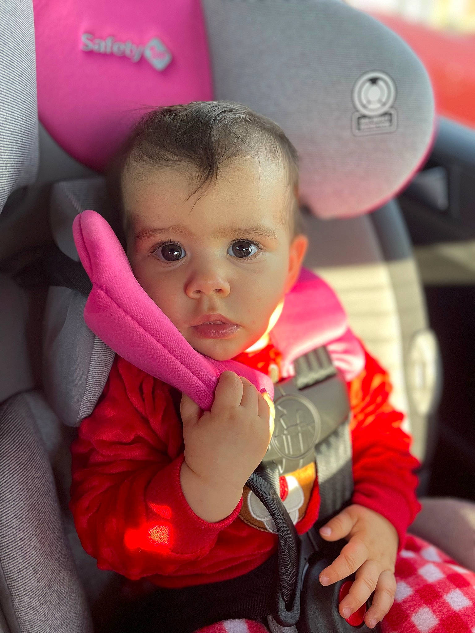Kamila joined the competition — help win amazing prizes! auto_part, baby, baby_products, baby_toddler_clothing, car_seat, chair, cheek, child, comfort, eye, fun, gesture, happy, magenta, person, pink, sitting, skin, tartan, thumb