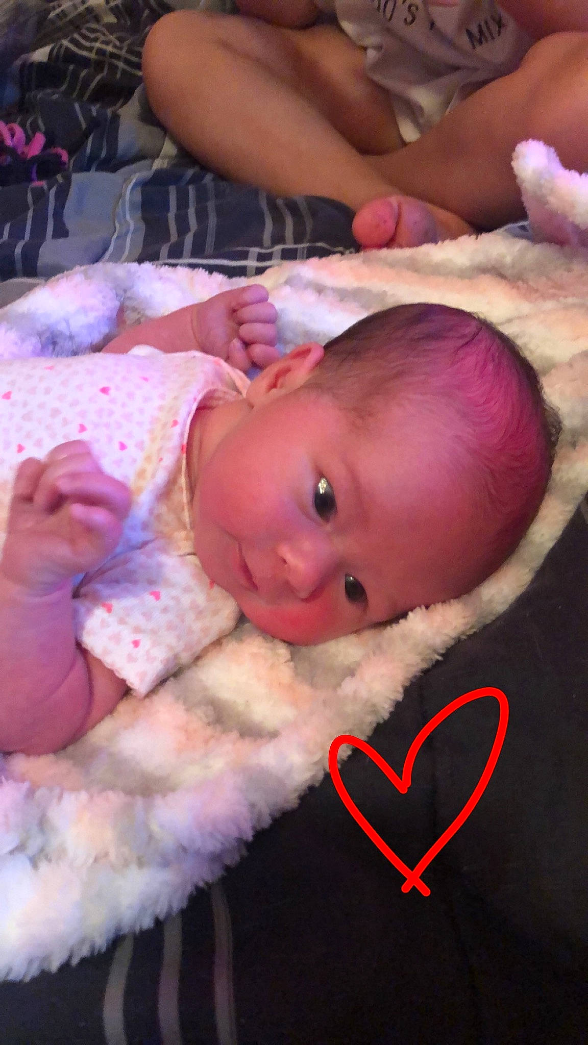 Kenley is registered to the contest to win money with this photo: baby, cheek, child, ear, eye, hand, head, mouth, nose, person, pink, skin, toddler