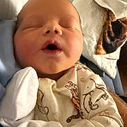 Jasper joined the competition — help win amazing prizes! newborn, baby, infant, sleeping, face, portrait, onesie, pajamas, tiger_pattern, blanket, swaddled, bed, indoors, cozy, cute, resting, closed_eyes, open_mouth, baby_clothing, photograph