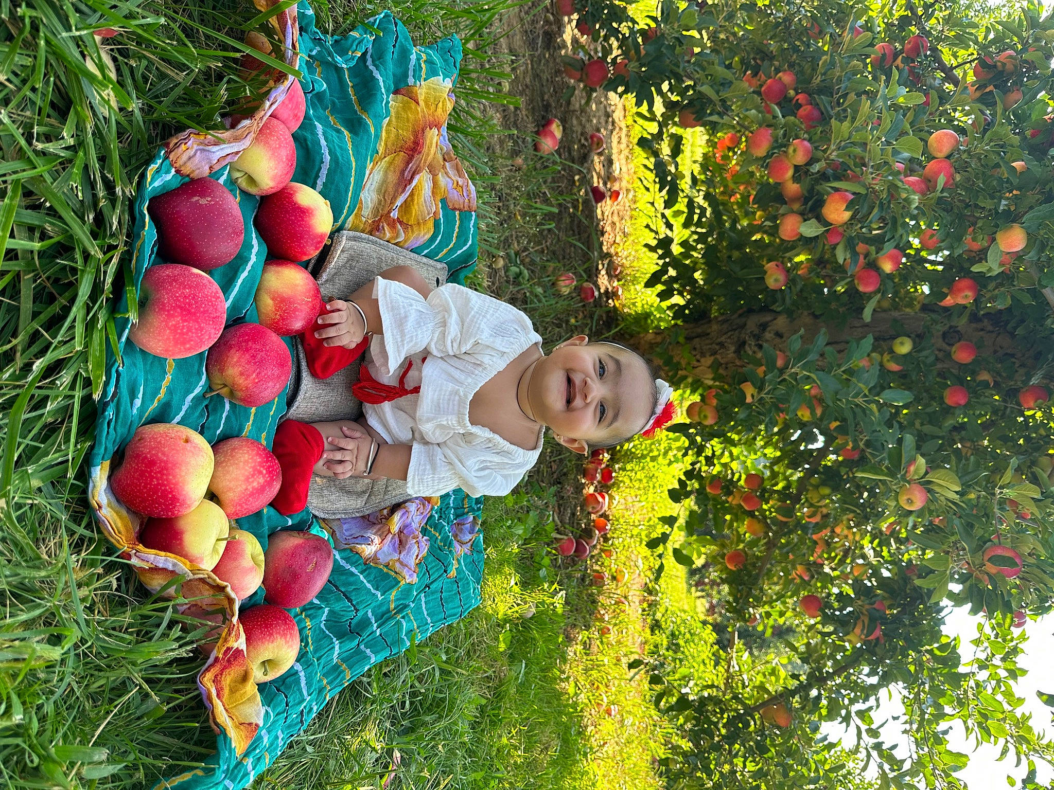 Kimaya is registered to the contest to win money with this photo: branch, child, christmas_ornament, event, flower, fun, garden, grass, happy, joy, leaf, leisure, people_in_nature, person, plant, smile, spring, summer, toddler, toy
