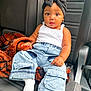 baby, baby_fashion, blanket, bow, car_seat, cargo_pants, child, clothing, curious, cute, denim, expression, headband, indoor, infant, person, portrait, seat, socks, white_tank_top
