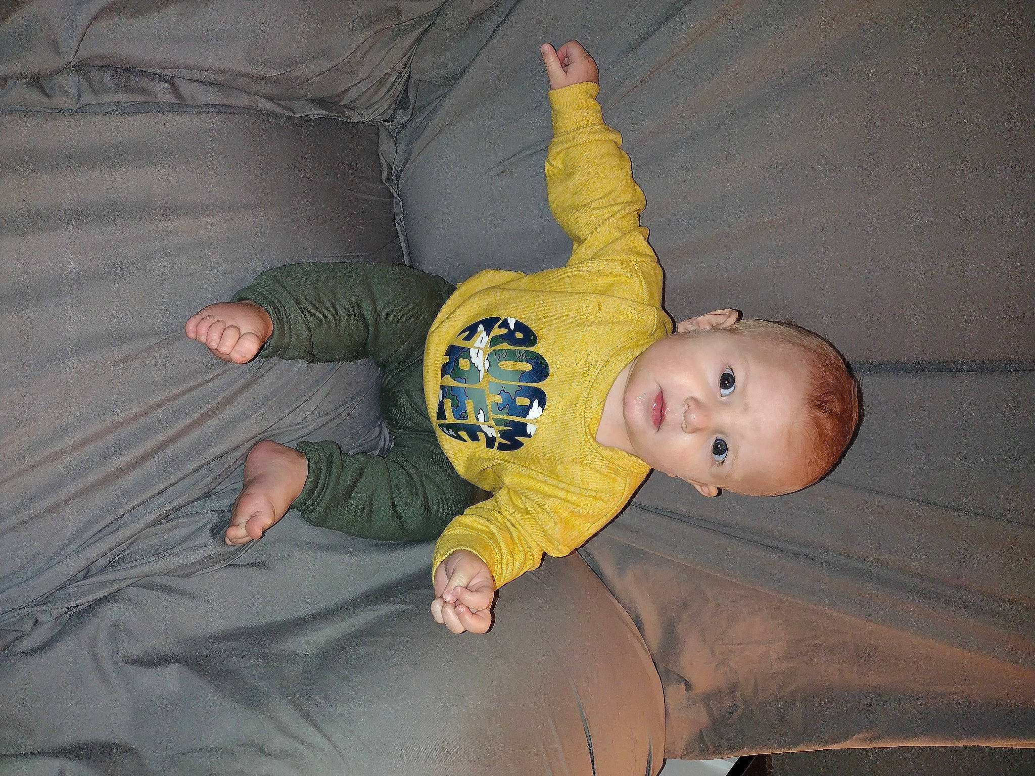 John joined the competition — help win amazing prizes! baby, baby_products, baby_toddler_clothing, cheek, child, comfort, finger, flash_photography, flooring, fun, grass, human_body, lap, person, room, sitting, toddler, tree, wood