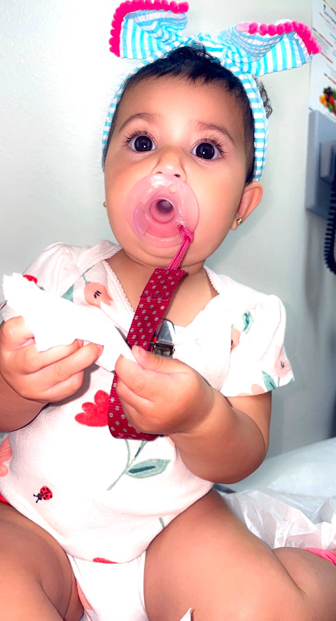 Hailey is registered to the contest to win money with this photo: baby, baby_safety, baby_toddler_clothing, cheek, chest, comfort, finger, gesture, hand, health_care, leg, lip, mouth, nail, person, pink, skin, stomach, surprise, thigh