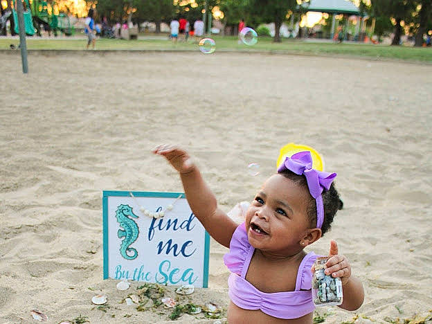Xeidorn joined the competition — help win amazing prizes! baby, beach, face, fun, grass, green, happy, hat, leisure, morning, people, people_on_beach, person, photograph, pink, public_space, summer, sun_hat, toddler, travel