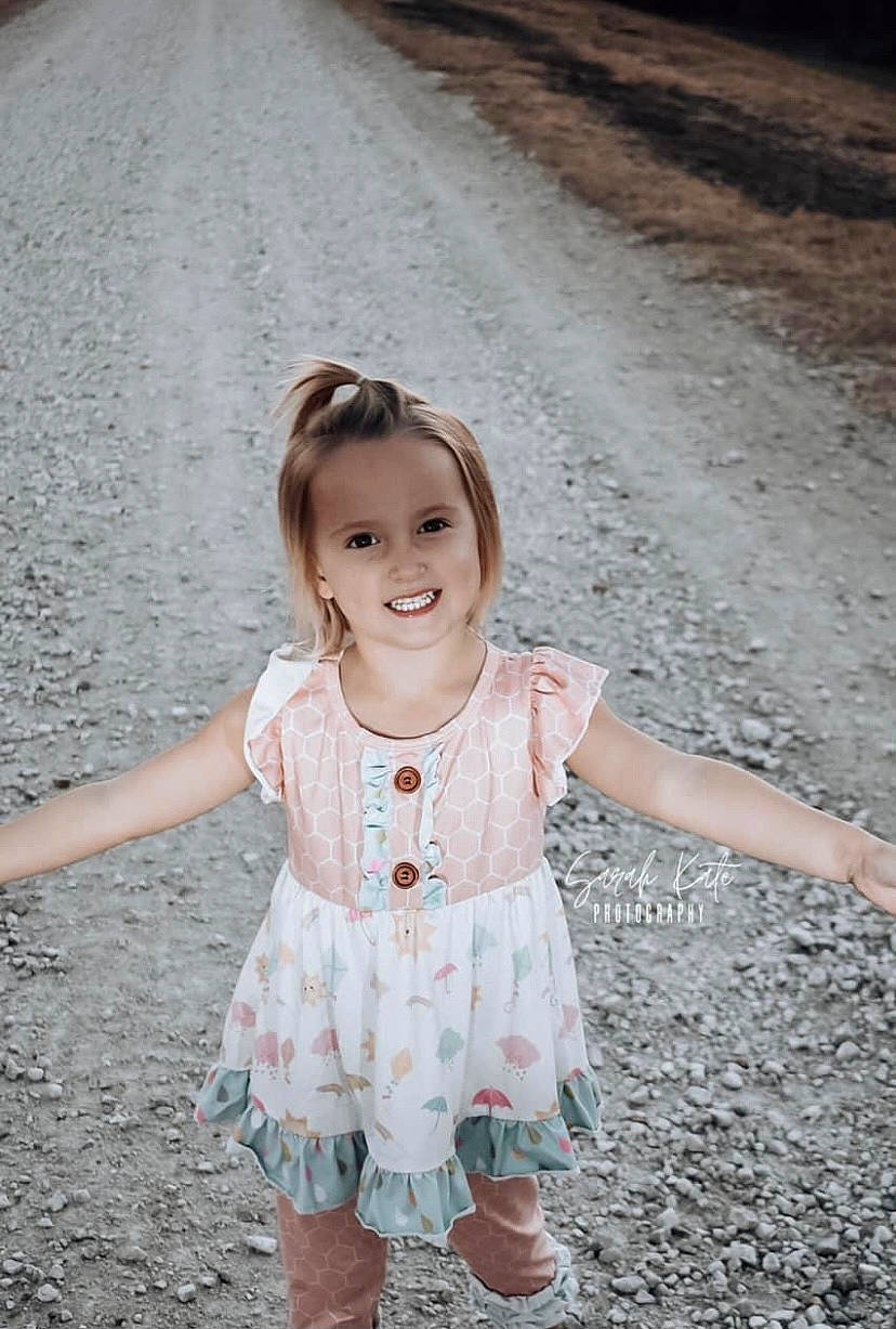 Ansleigh joined the competition — help win amazing prizes! baby_toddler_clothing, child, dress, eye, facial_expression, flash_photography, fun, grass, happy, head, iris, joy, leaf, people_in_nature, person, pink, public_space, skin, smile, standing