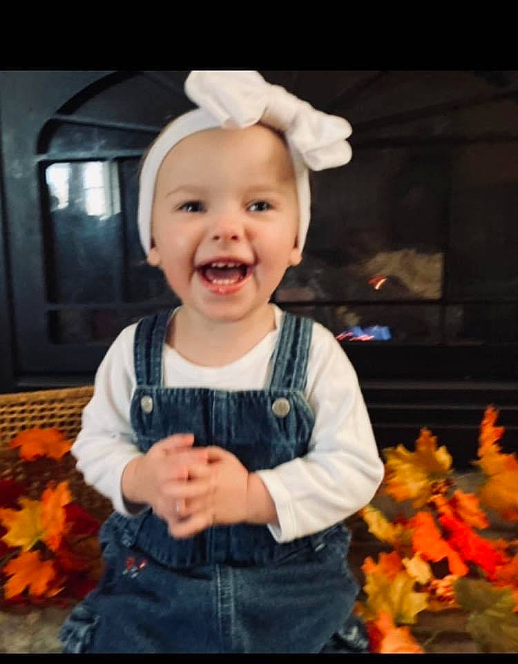 Zoey joined the competition — help win amazing prizes! baby, baby_toddler_clothing, black, cheek, clothing, dress, eye, face, facial_expression, flash_photography, happy, headwear, iris, orange, organ, person, plant, skin, sleeve, smile