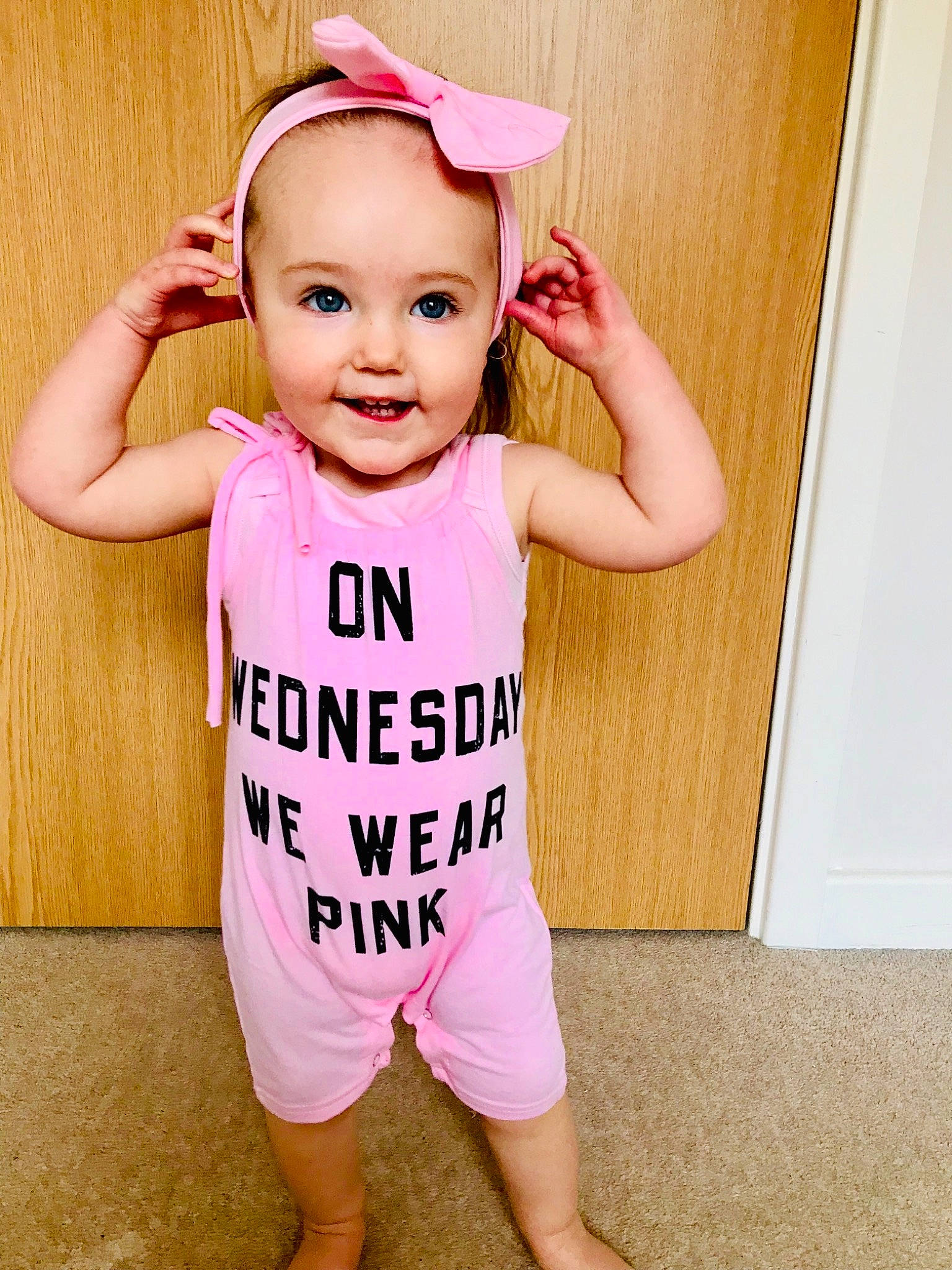 Caitlin is registered to the contest to win money with this photo: baby, baby_bloomers, baby_products, baby_toddler_clothing, child, child_model, clothing, infant_bodysuit, joy, outerwear, pattern, person, pink, product, sleeve, t_shirt, toddler