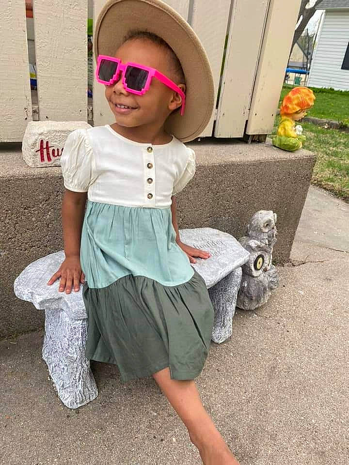 Malia joined the competition — help win amazing prizes! baby_toddler_clothing, cap, child, cool, eyewear, fashion_accessory, fun, goggles, human_leg, leisure, people, person, pink, sidewalk, sleeve, smile, sunglasses, t_shirt, toddler, vision_care